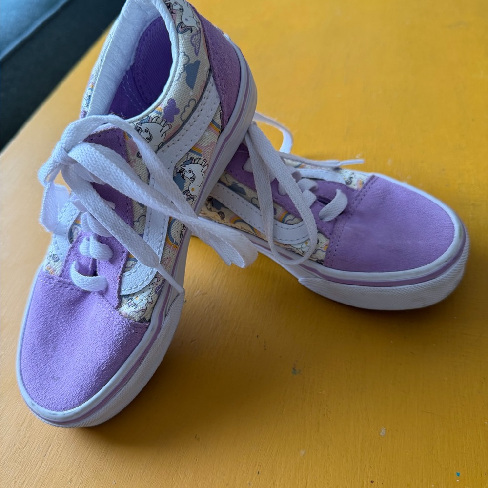 Vans Old Skool or Old Skool V shoes in a purple and white unicorn pattern